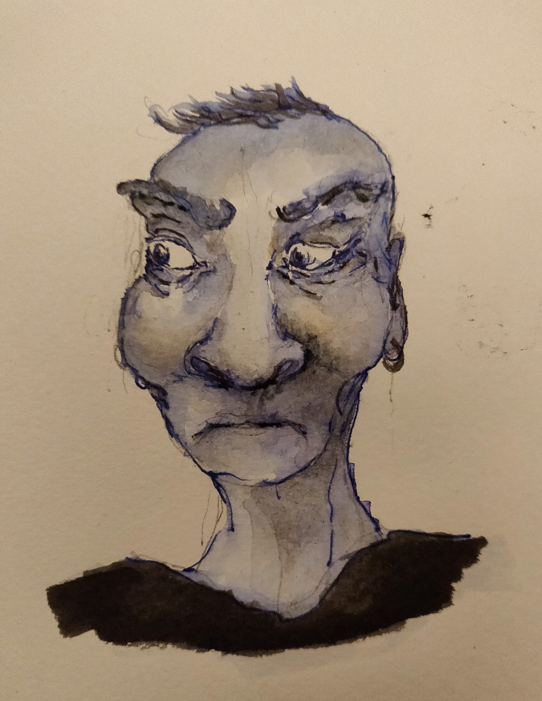 Personnage I : un visage bleuté aux sourcils froncés, à l’encre.